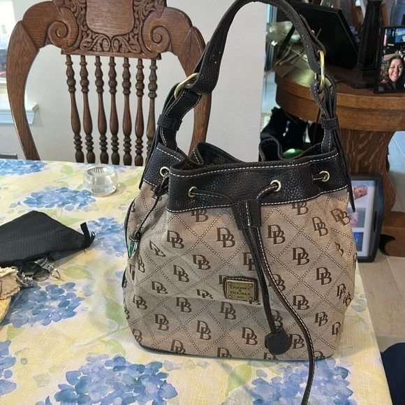 Dooney & Bourke Brown and Tan Shoulder Bag 10 x 12 x 6 drawstring closure - Picture 2 of 10